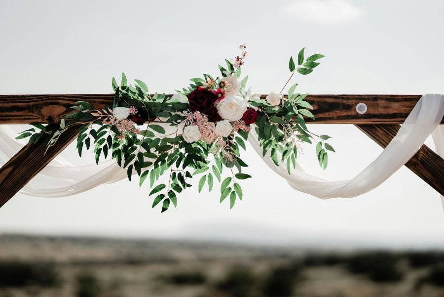 Wedding arch with flowers and greenery